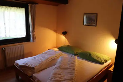 Ein Bett oder Betten in einem Zimmer der Unterkunft Ferienhaus Robinson Sonnenkreisel 133