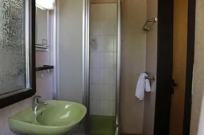 Ein Badezimmer in der Unterkunft Ferienhaus Robinson Sonnenkreisel 133