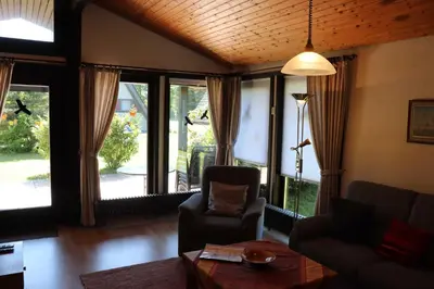 Ein Sitzbereich in der Unterkunft Ferienhaus Robinson Sonnenkreisel 133