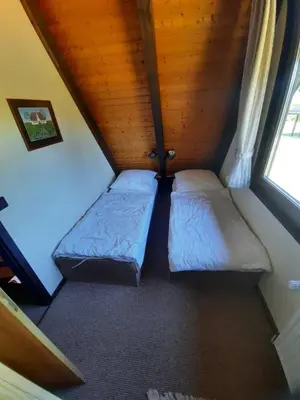 Ein Bett oder Betten in einem Zimmer der Unterkunft Ferienhaus Winnetou Sonnenkreisel 145