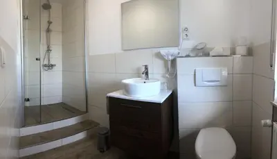 Ein Badezimmer in der Unterkunft Landgasthof Waldeck