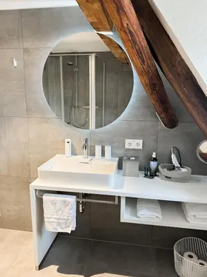 Ein Badezimmer in der Unterkunft Gasthaus Faust