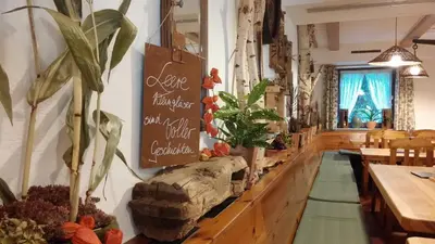 Ein Restaurant oder anderes Speiselokal in der Unterkunft Kachelofa GbR