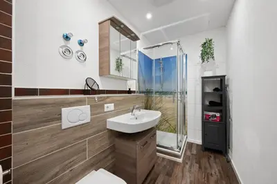 Ein Badezimmer in der Unterkunft BackHome - SUITE L - Parkhaus - Fantastische Schlosslage - SmartTV - Waschmaschine - Netflix - 50qm - 24h Checkin- Apartment 3
