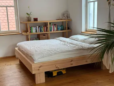 Ein Bett oder Betten in einem Zimmer der Unterkunft Olive Garden