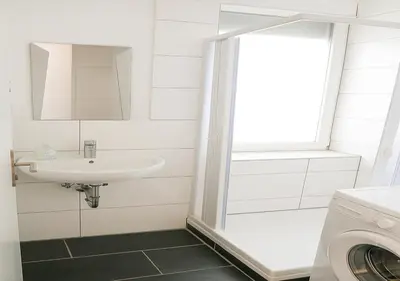 Ein Badezimmer in der Unterkunft Maya Zimmer Zentral Bequem