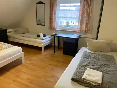 Ein Bett oder Betten in einem Zimmer der Unterkunft Bew Monteurzimmer - Waldbronn