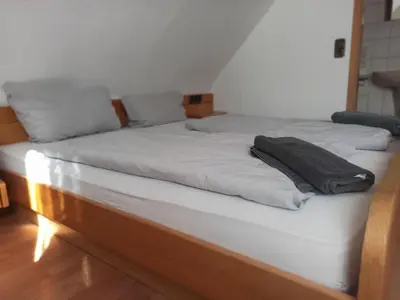 Ein Bett oder Betten in einem Zimmer der Unterkunft Bew Monteurzimmer - Waldbronn