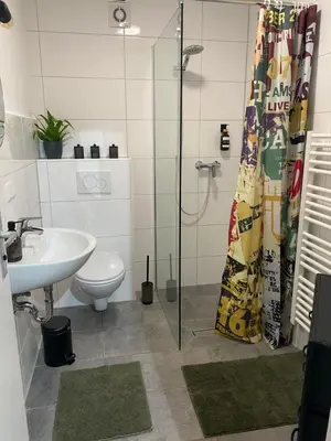 Ein Badezimmer in der Unterkunft ImmerFrei Apartments