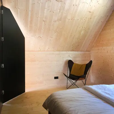 Ein Bett oder Betten in einem Zimmer der Unterkunft Burgstrasse Apartment Ost mit Garten und Sauna