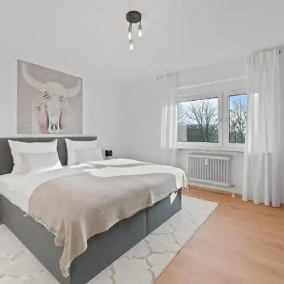 Roomfall Apartment am Kurpark mit TG & Wifi & Balkon