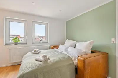 Ein Bett oder Betten in einem Zimmer der Unterkunft Sali Homes - Neuenstadt am Kocher