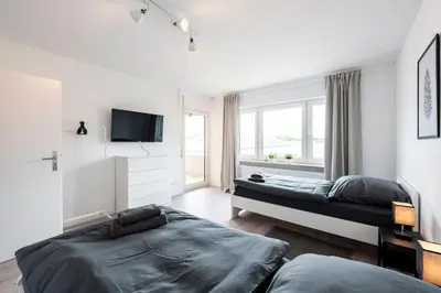 Ein Bett oder Betten in einem Zimmer der Unterkunft HA01 Großes Apartment am Hafen!