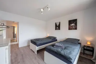 Ein Bett oder Betten in einem Zimmer der Unterkunft HA01 Großes Apartment am Hafen!