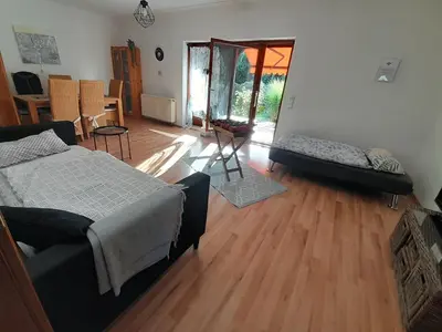 Ein Bett oder Betten in einem Zimmer der Unterkunft Alte Villa mit Terrasse