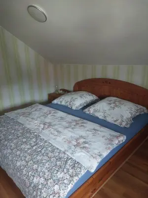 Ein Bett oder Betten in einem Zimmer der Unterkunft haus krümel
