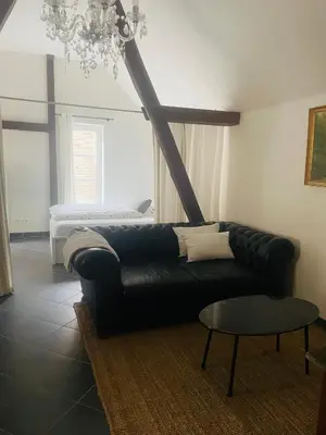 Ein Sitzbereich in der Unterkunft Monteurwohnung Ferienwohnung
