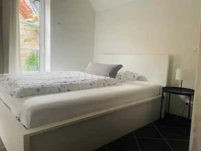 Ein Bett oder Betten in einem Zimmer der Unterkunft Monteurwohnung Ferienwohnung