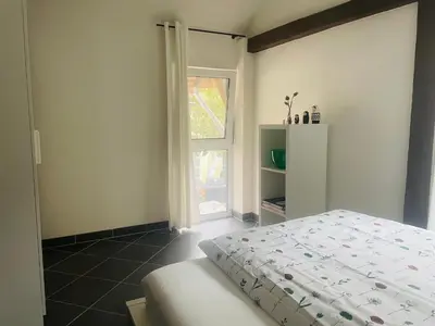 Ein Bett oder Betten in einem Zimmer der Unterkunft Monteurwohnung Ferienwohnung