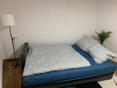Ein Bett oder Betten in einem Zimmer der Unterkunft Ferienstüble im Zabergäu- Ferienwohnung