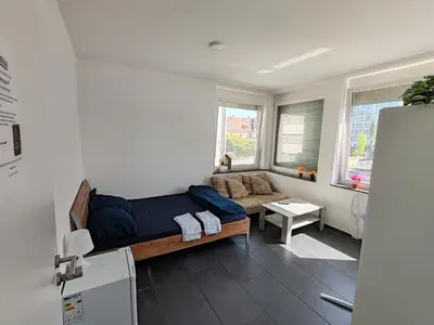 Ein Bett oder Betten in einem Zimmer der Unterkunft Anna Zimmer Zentral Bequem
