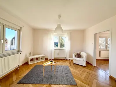 Ein Bett oder Betten in einem Zimmer der Unterkunft Komforthaus Gartenfreude