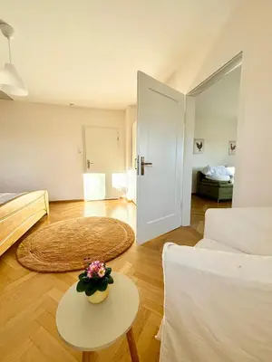 Ein Bett oder Betten in einem Zimmer der Unterkunft Komforthaus Gartenfreude