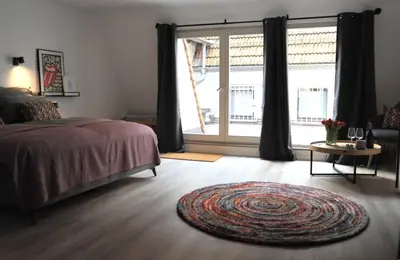Ein Bett oder Betten in einem Zimmer der Unterkunft Deluxe-Apartment Altstadt