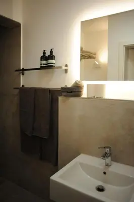 Ein Badezimmer in der Unterkunft Deluxe-Apartment Altstadt