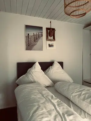 Ein Bett oder Betten in einem Zimmer der Unterkunft ANINA