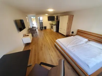 Ein Bett oder Betten in einem Zimmer der Unterkunft Ferienwohnung Blumenstiel
