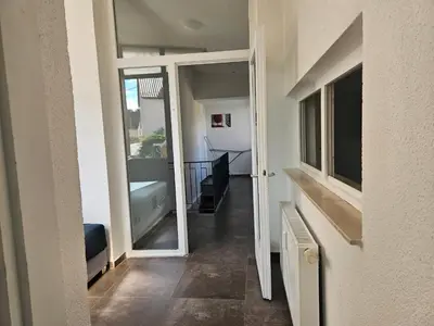 Ein Bett oder Betten in einem Zimmer der Unterkunft Welcome to Ndé-flat in Abstatt