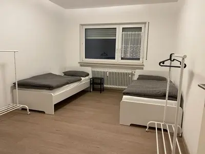 Ein Bett oder Betten in einem Zimmer der Unterkunft MSC Lampertheim