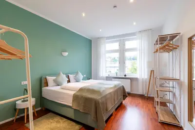Ein Bett oder Betten in einem Zimmer der Unterkunft Weinstraßenzauber mitten in NW incl Parkplatz