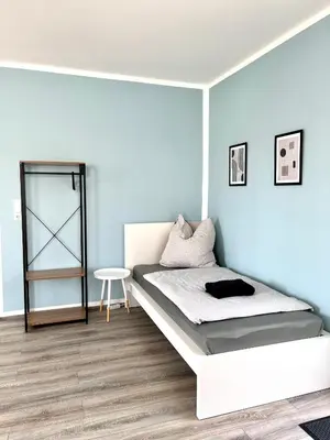 Ein Bett oder Betten in einem Zimmer der Unterkunft Handwerker Wohnung - WLAN - Küche - Bad - bis zu 4 Personen