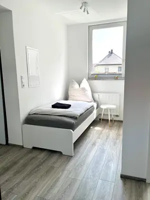 Ein Bett oder Betten in einem Zimmer der Unterkunft Handwerker Wohnung - WLAN - Küche - Bad - bis zu 4 Personen