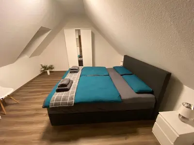 Ein Bett oder Betten in einem Zimmer der Unterkunft Appartement am Kaibach - Küche - Balkon - Bad