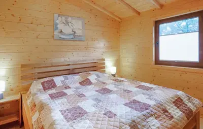 Ein Bett oder Betten in einem Zimmer der Unterkunft Awesome Home In Merzalben With Wi-Fi