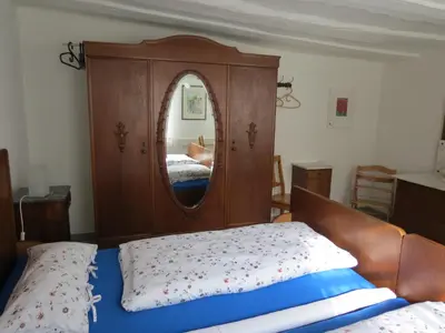 Ein Bett oder Betten in einem Zimmer der Unterkunft Im Alten Kaufhaus