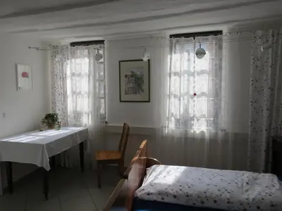 Ein Bett oder Betten in einem Zimmer der Unterkunft Im Alten Kaufhaus