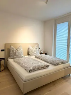 Ein Bett oder Betten in einem Zimmer der Unterkunft Stilvolle Oase: Ruhiges Cityhaus