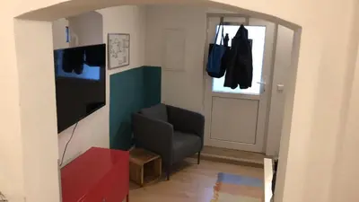 Ein Sitzbereich in der Unterkunft 1-Zimmer Gartenwohnung in Speyer