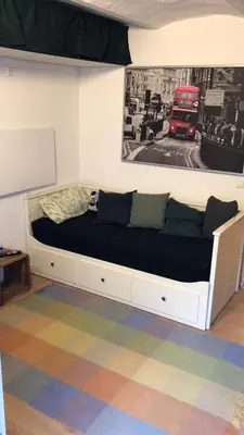 Ein Sitzbereich in der Unterkunft 1-Zimmer Gartenwohnung in Speyer