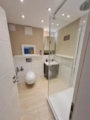 Ein Badezimmer in der Unterkunft Monteurwohnung, zentral, voll ausgestattet in Uninähe
