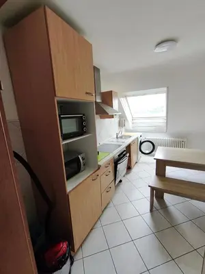 Küche/Küchenzeile in der Unterkunft Bew Penthouse - 4-Zimmer und Terrasse