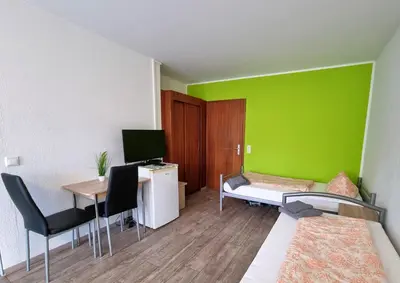 Ein Bett oder Betten in einem Zimmer der Unterkunft Bew Monteurzimmer - Karlsbad