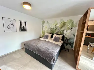 Ein Bett oder Betten in einem Zimmer der Unterkunft Ferienwohnung im Odenwald