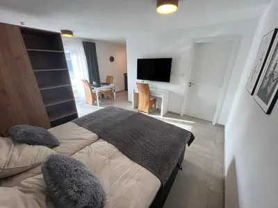 Ein Bett oder Betten in einem Zimmer der Unterkunft Ferienwohnung im Odenwald