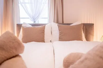 Ein Bett oder Betten in einem Zimmer der Unterkunft Residenz im Denkmal - Erlebnispark Tripsdrill - Familie - Freude - Spaß