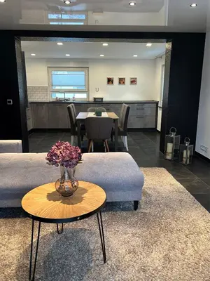 Ein Sitzbereich in der Unterkunft Alex Design Appartment
